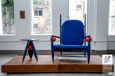 The “Elf” deck chair and “Magnolia” side table are on display at the “Echoes of the Woods” exhibition
